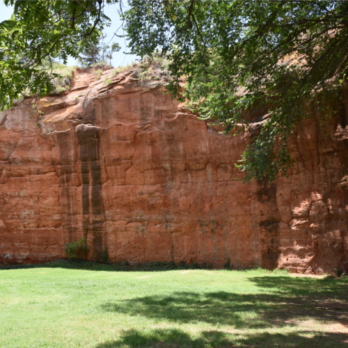 Red Rock State Park - Photo of a red rock cliff